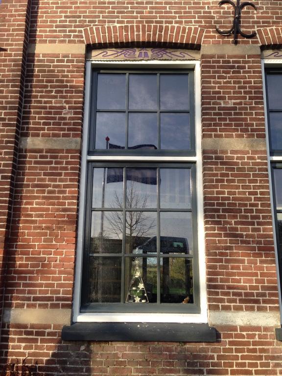 Suite School 15 A Zonnemaire Номер фото